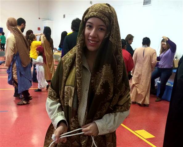 Quiñones dressed as a person of the "pueblo" in the re-enactment this year for the "Via Crusis," a procession that is part of the Passion of Christ/Stations of the Cross commemoration before Easter by her church